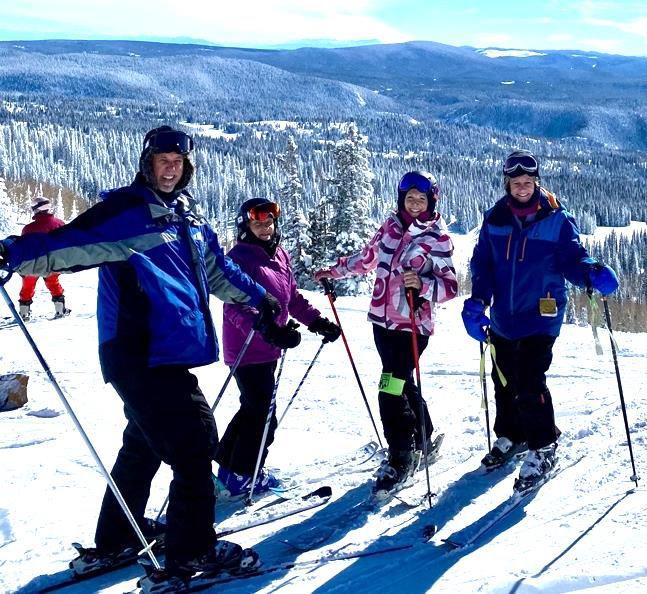 Group of skiers at top of Steamboat slope